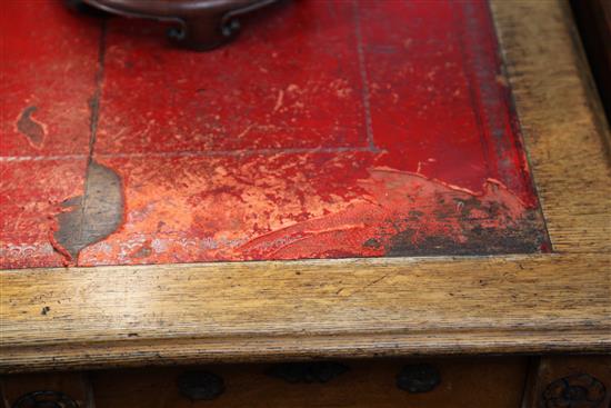 Gillows after a design by A.W.N.Pugin. A Victorian gothic revival oak desk, W. 5ft. D. 2ft 6in. H.2ft 6in.